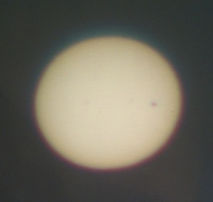 Photograph of transit projection, sunspots visible